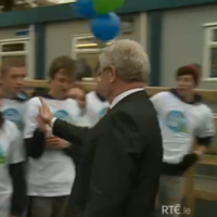 Watch Eamon Gilmore go in for a super awkward high-five (GIF)