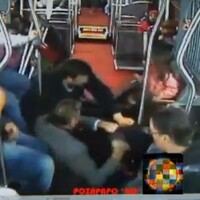 Bus passengers join together to overpower armed robber 