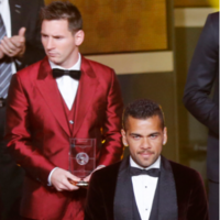 Leo Messi continues his 'brave' fashion choices with resplendent red suit