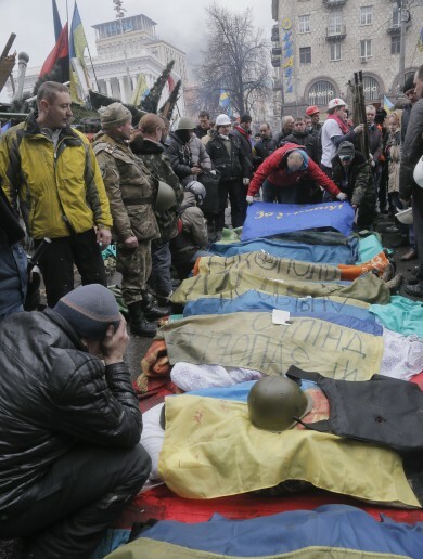 Death toll climbs to 60 in Kiev as 67 police officers 'seized'
