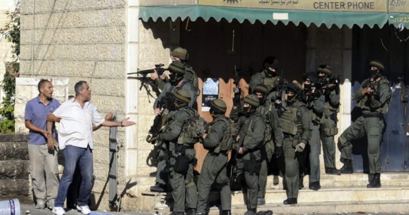 Image result for palestinians queue at israeli border crossing