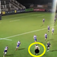 Streaker makes tackle in 'Clash of the Titans,' sparks mini-brawl