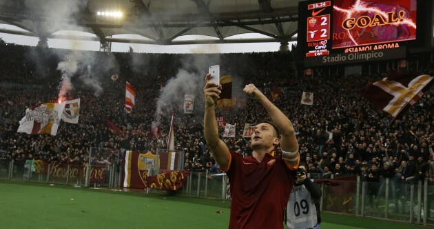 Totti bags two goals in the Rome derby and takes a selfie with the Curva Sud