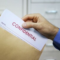 Investigation launched after thousands of personal documents found on side of road