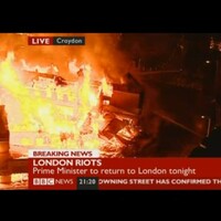 Cameron cuts holiday short as violence spreads in London and Birmingham