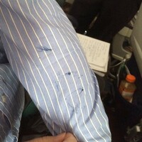 A woman was kicked off a flight for 'stabbing' snoring man with pen