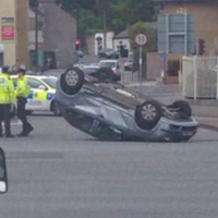 Car flips over in rush hour crash in Dublin