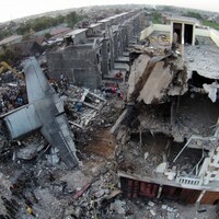 Air force plane crashes into city killing at least 140