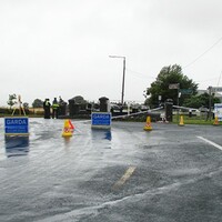 Man rescued after being pulled from upside-down car in canal