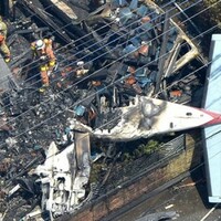 Three killed after plane crashes on housing estate