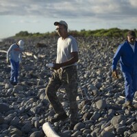 Island 'on alert' as more plane wreckage washes up