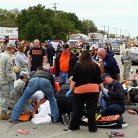 Four dead and 44 injured after car strikes US homecoming parade crowd