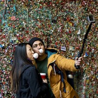 This wall is having 20 years' worth of chewing gum power hosed off of it