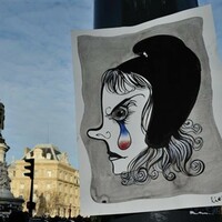 Across Paris graffiti artists send message of defiance to attackers  