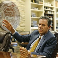 University president tells students to get guns to "end those Muslims before they walk in and kill"