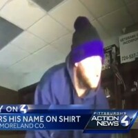 Burglar caught after robbing office while wearing shirt with his name written on it 