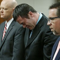 White ex-policeman found guilty of sexually assaulting eight black women