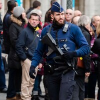 Six arrested in Belgium and armed officers' leave cancelled in London ahead of NYE