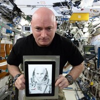 Astronaut Scott Kelly posed with an Irish artist&acirc;��s work IN SPACE 