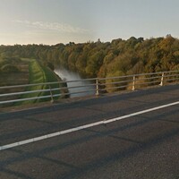 Man dies after car plunges off motorway into river