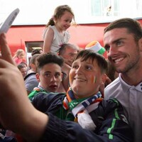 Photos: Boys in Green arrive home to a hero's welcome 