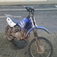 Woman dies after being struck by scrambler bike while walking her dog