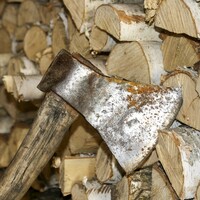 Men smash windows of homes with hatchets