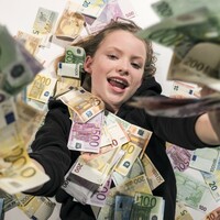 Big winners: Family collects a cool &acirc;�&not;2.3 million from Lotto headquarters 