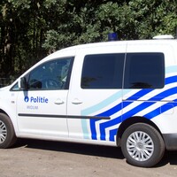 Belgian police officers questioned after being found with vanload of migrants in France 