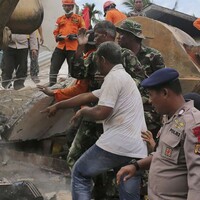 At least 97 dead and hundreds injured in Indonesian earthquake