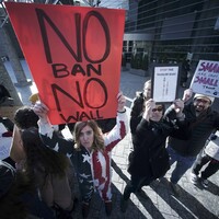 White House spokesman says order is 'not a travel ban' (despite Trump saying it was yesterday)