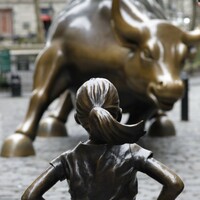 'Fearless girl' stares down the iconic Wall Street bull