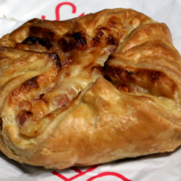 Man who claimed he was falsely accused of not paying for a jambon pastry awarded &acirc;�&not;20,000