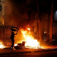 Activist shot dead as protesters storm government building in Paraguay