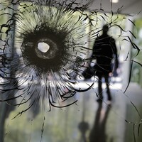 Suspect wanted in wake of Paris shooting hands himself in to Belgian police