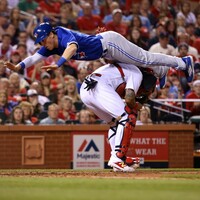 One of the Toronto Blue Jays made an amazing flip over another player to score last night