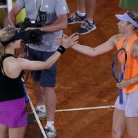 Bouchard beats 'cheater' Sharapova in intense Madrid encounter