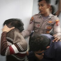 Indonesian Sharia court sentences two men to 85 lashes of the cane for having sex