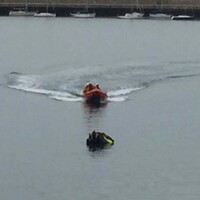 RNLI rescues two people without life jackets from submerged jet ski