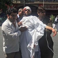 At least 64 people killed and 320 wounded as bomb blast rips through Afghan diplomatic quarter