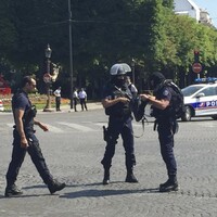 Man dead after driving car 'loaded with gas canisters' into police van in Paris