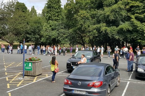 A view of the long queue of people waiting to vote in Tallaght this morning.
