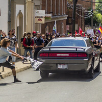 Trump condemns hate on 'many sides' after woman killed by car at anti-Nazi protest