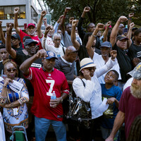 Colin Kaepernick's backers rally in support of controversial QB