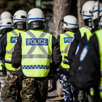 Attack on officer outside Canadian football game and high-speed chase being investigated as terrorism