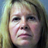 Woman accused of dressing as clown and killing wife of man she later married faces death penalty