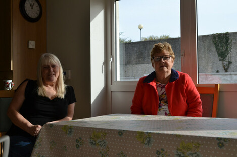 Sarah Duggan (left) and Margaret Baker (right) in the community room of their apartment complex in Ballygall. 