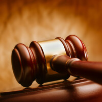 Man who broke into estranged partner's home and made threat to kill has jail term cut 