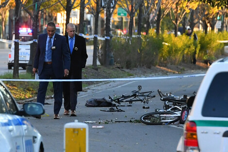 Police secure the scene at the bike path at Houston Street and West Street in lower Manhattan.
