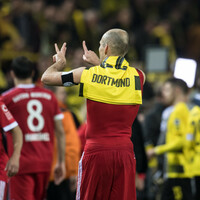 Arjen Robben makes history with stunning goal as Bayern boss Dortmund in derby 